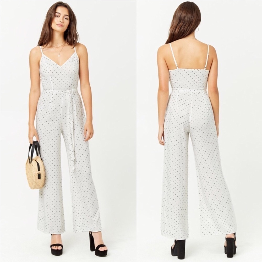 Forever 21 wide leg polka dot sleeveless jumpsuit in white and black. Size L